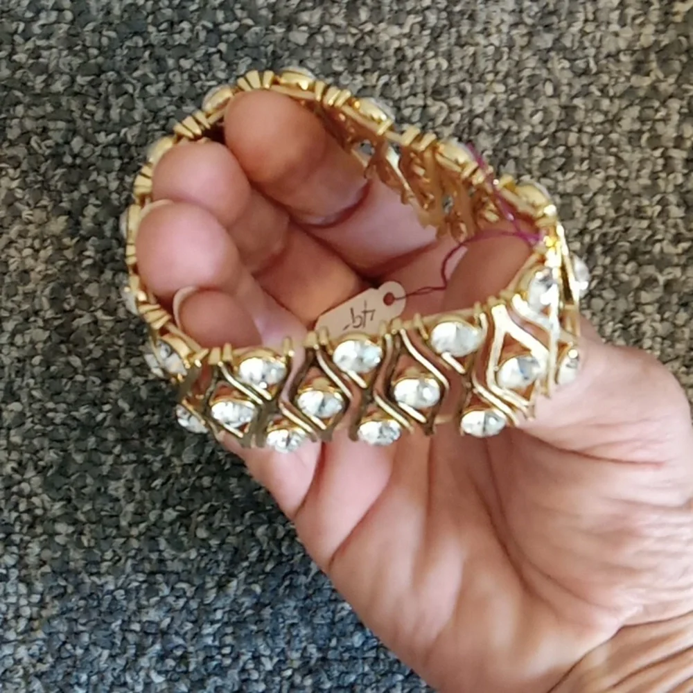 Gold tone and crystal stretch bracelet